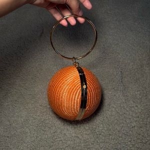 Orange ball ring purse